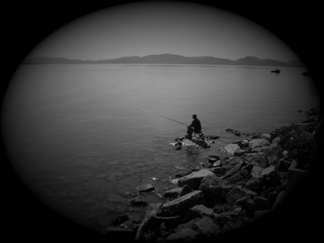 Pescatore sul Trasimeno